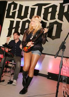 Gratuitous Pix of Blonde 'Sensation' Playing Guitar Hero 5