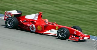 Michael Schumacher driving really fast.