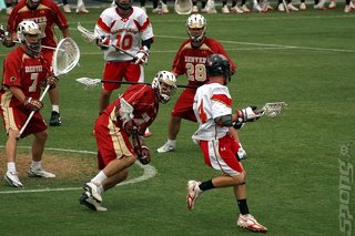 This is Lacrosse. It involves netted sticks.
