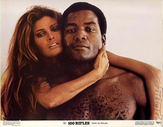 A cave-lady and Jim Brown.
