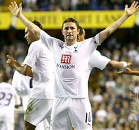 Robbie Keane illustrates how much he made in the transfer window. And how happy it made him.